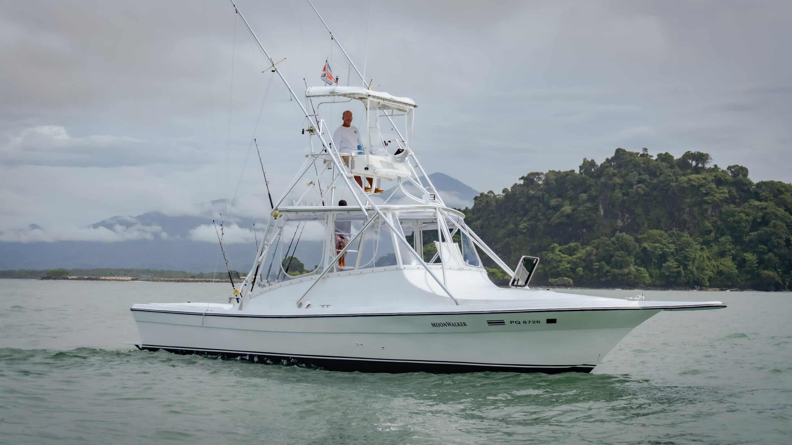 https://www.crfishingcharters.com/wp-content/uploads/2022/09/costa-rica-fishing-charters-marina-pez-vela-quepos-sportfihing-33-ft-Dawson-Moonwalker-billfish-marlin-CRFC.jpg